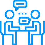 A blue line drawing of two people sitting across a table, facing each other, with speech bubbles above them, suggesting a conversation or discussion.